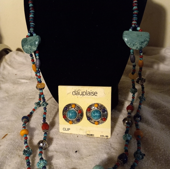 Used,not new multi colored mainly plastic 2strand necklace& matching clip ons. - Picture 3 of 4